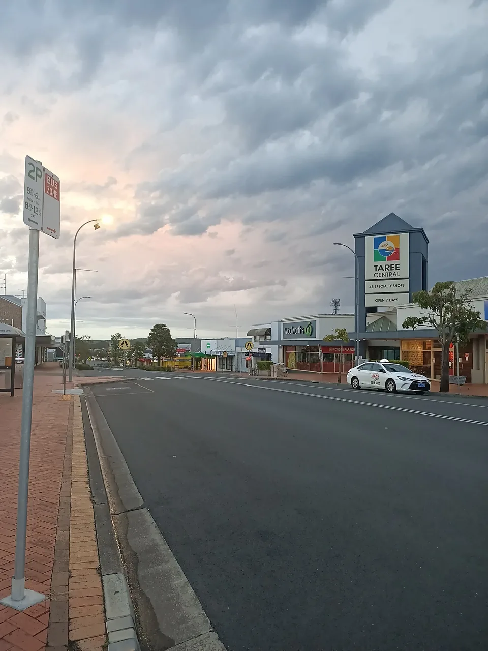Early morning sky with storm clouds clearing at sunrise in Taree, New South Wales, Australia