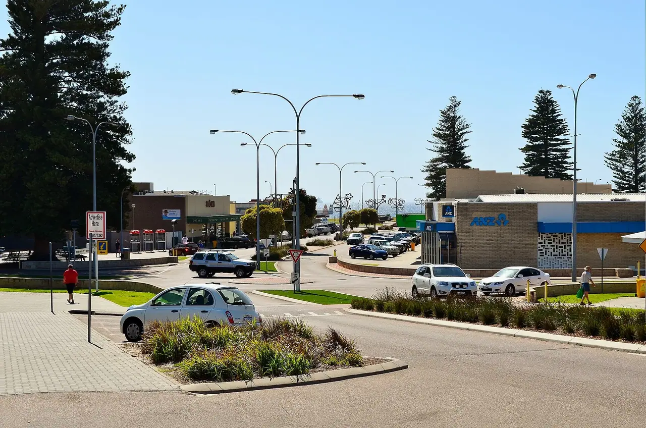 View of Andrew Street, Esperance, Western Australia . In the foreground is the roundabout marking the crossroads between Andrew Street and Dempster Street. In the background is th…