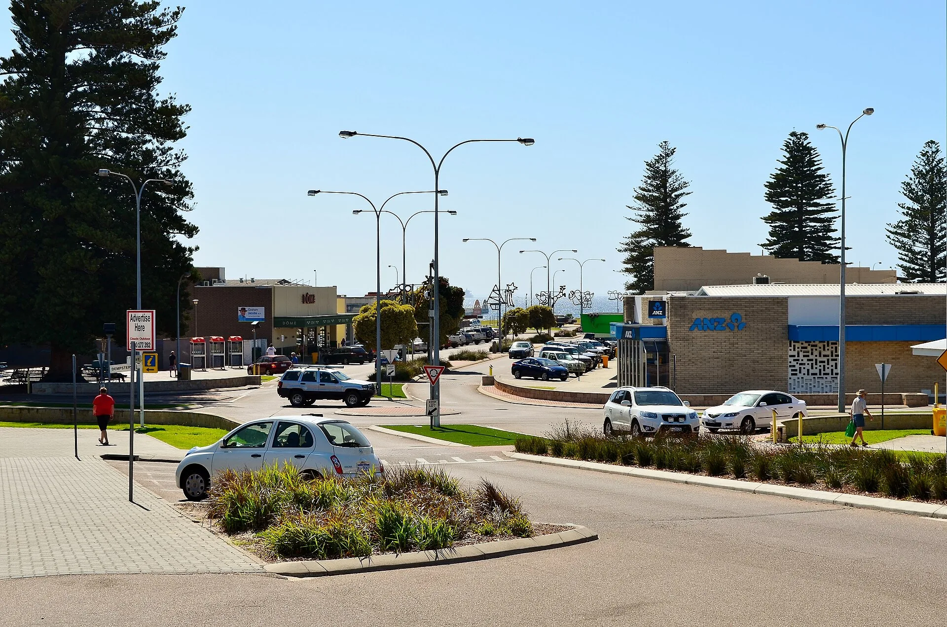 View of Andrew Street, Esperance, Western Australia . In the foreground is the roundabout marking the crossroads between Andrew Street and Dempster Street. In the background is th…